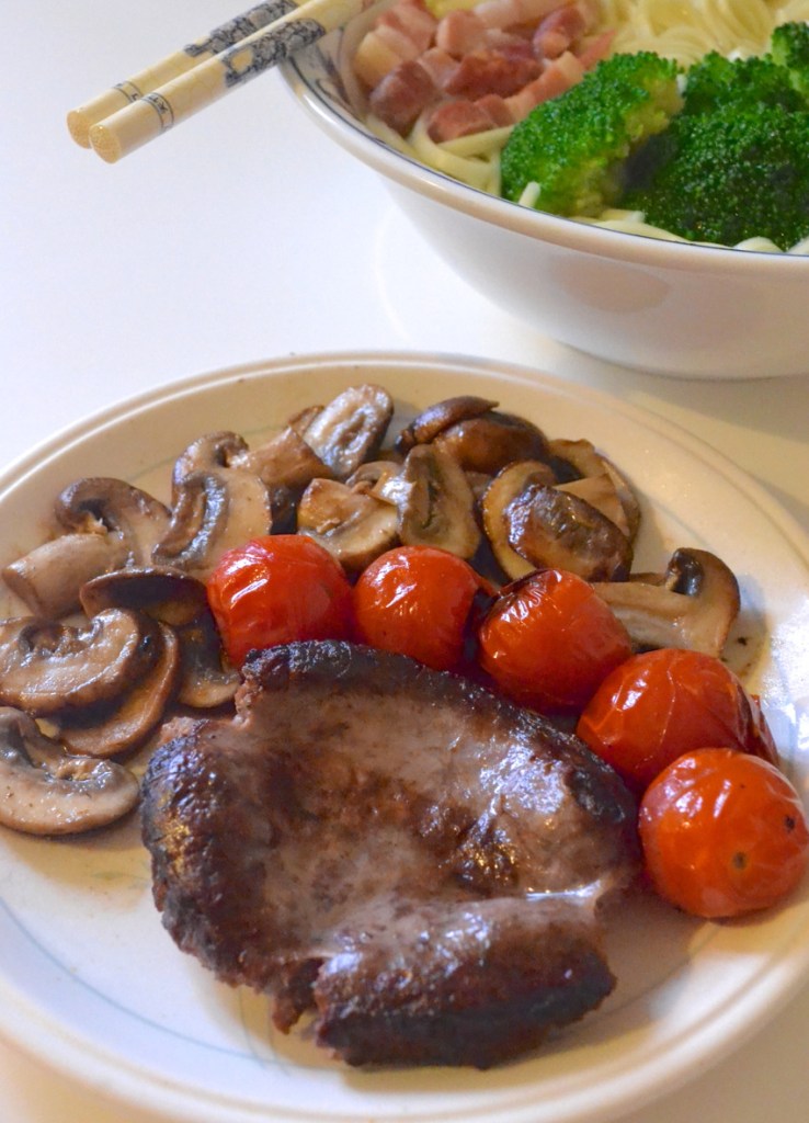 venison sausage with cherry tomato and mushroom